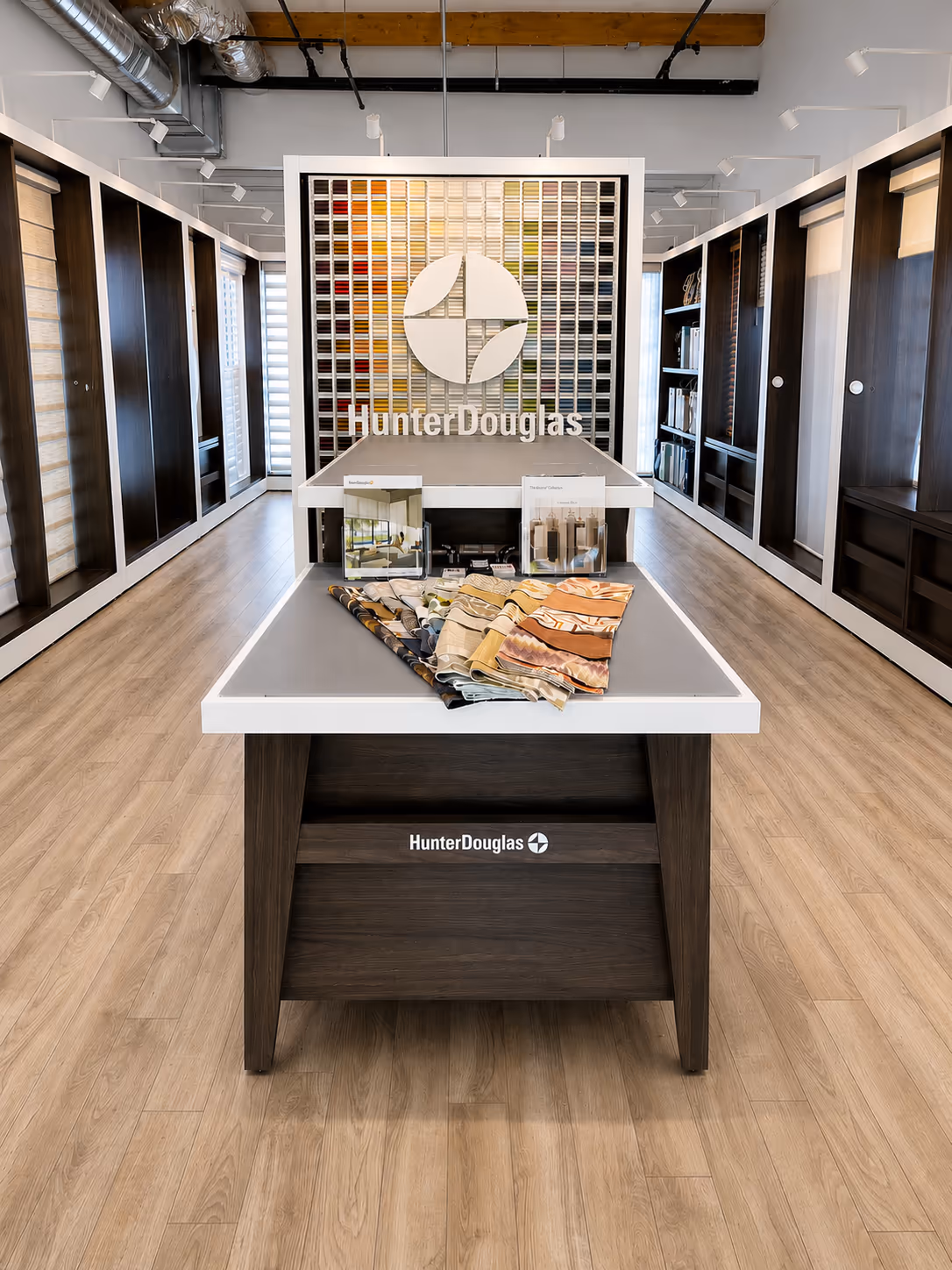 The Hunter Douglas gallery wall and working motorized window-covering displays inside the La Grange Window Coverings showroom in Windsor, CA